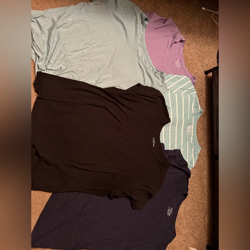 Time and tru t shirts one shows wear within arms. Most in brand new condition.